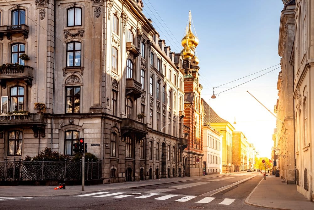church in city with sunlight Christian Speakers