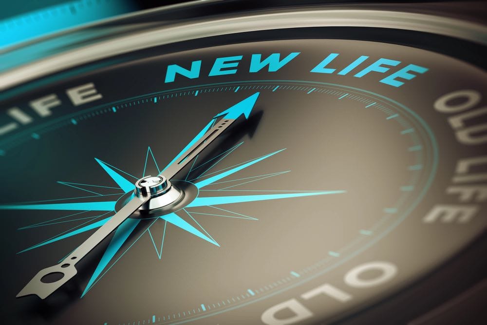 A compass with the words "New Life" at the true north direction