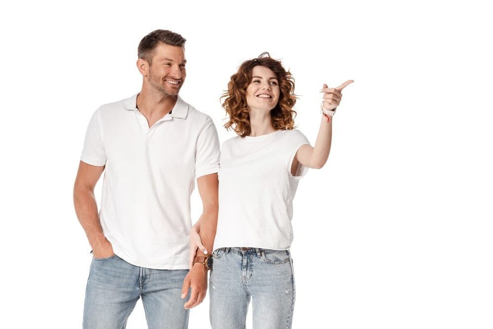 man and woman in white shirts hanging out