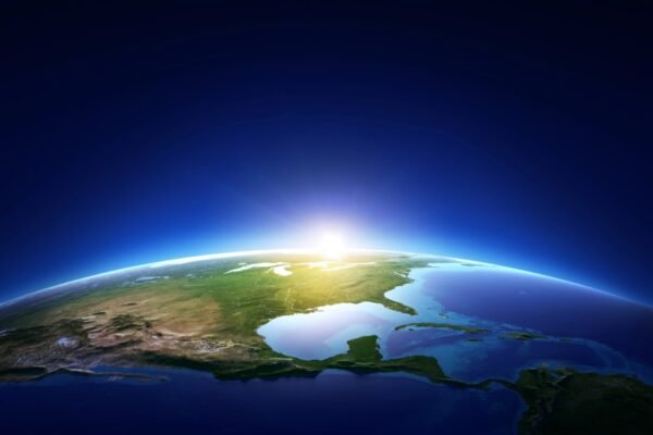 Sun rising over the earth